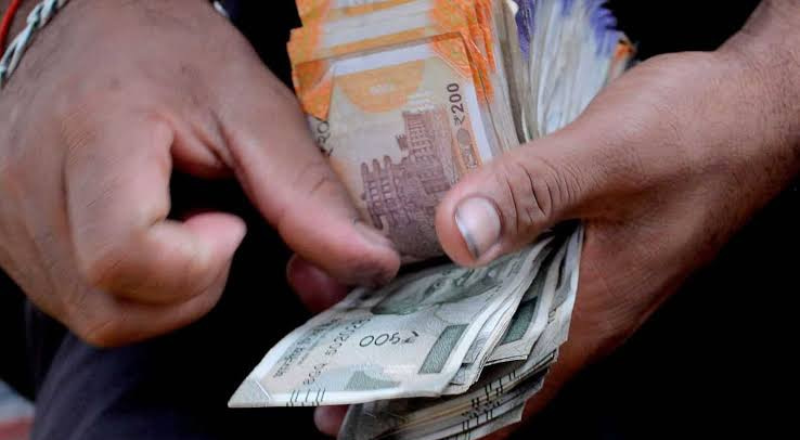 Pictures of Rupee Counting in hand